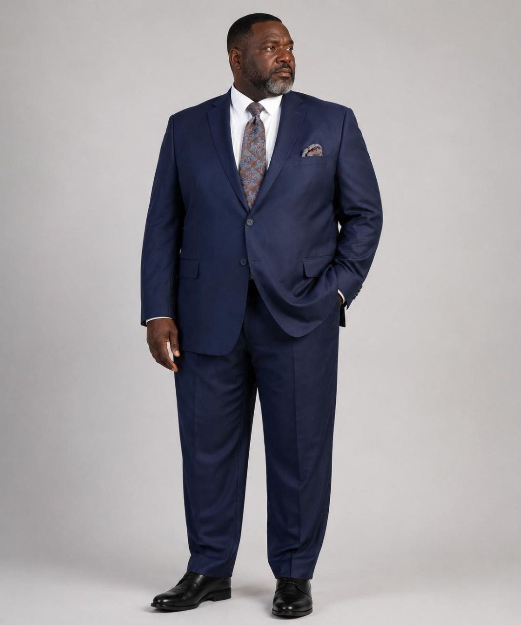 Model wearing navy Super 200’s wool extended size suit from The Third Gentleman