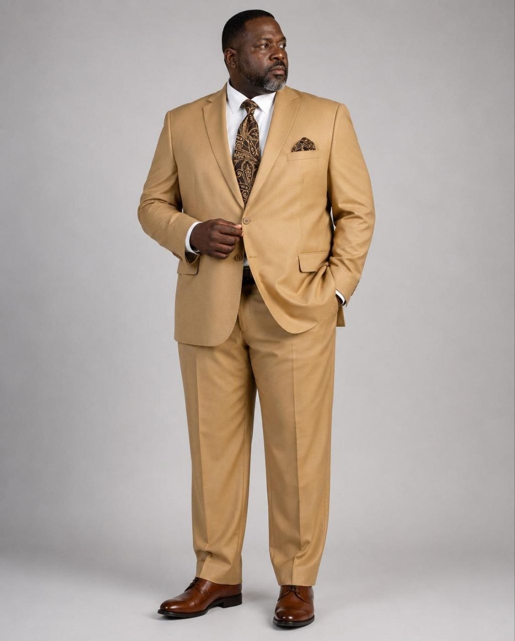 Model wearing camel Super 200’s wool extended size suit from The Third Gentleman