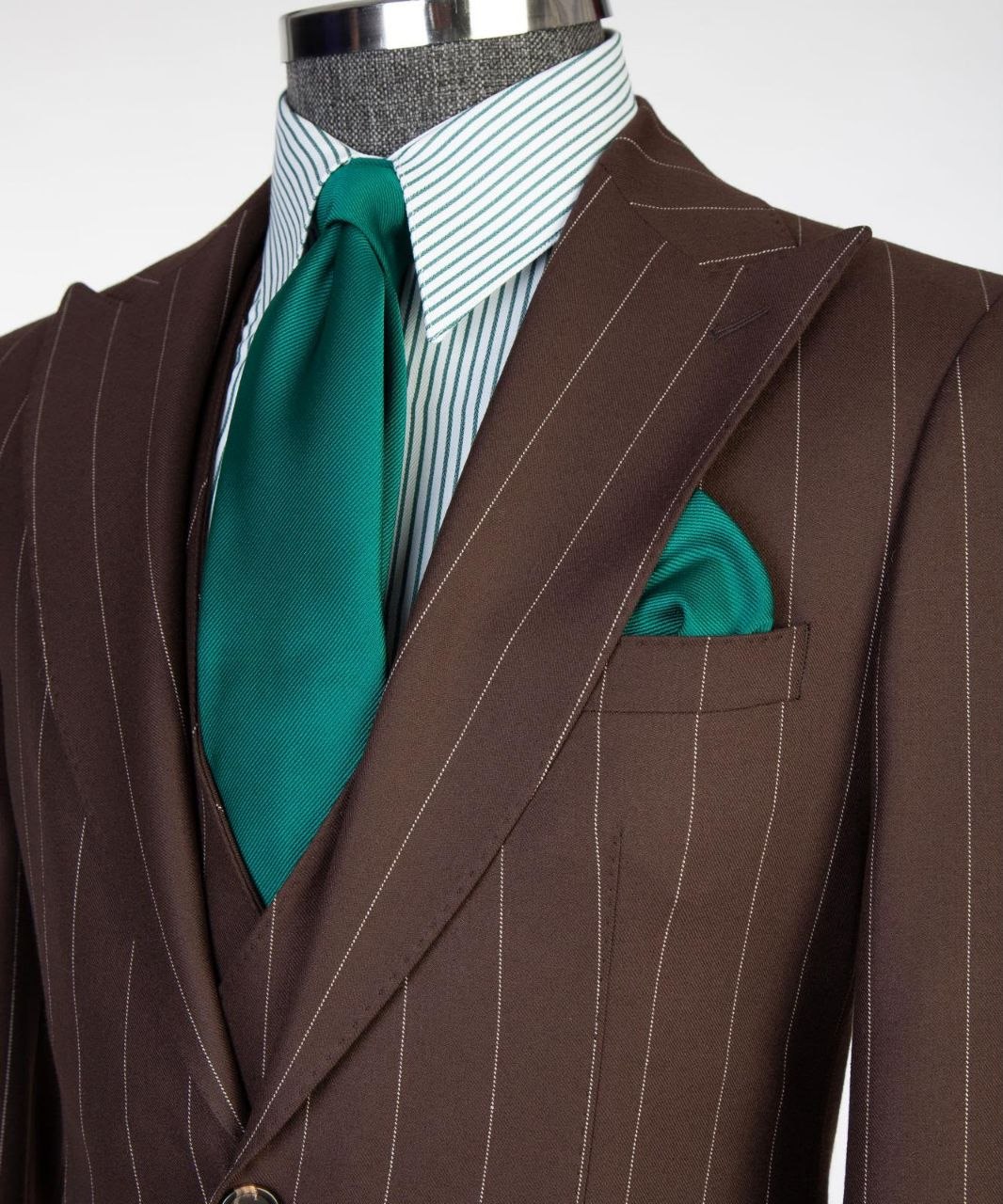 Chocolate brown pinstripe suit with peak lapels and waistcoat detail from The Third Gentleman