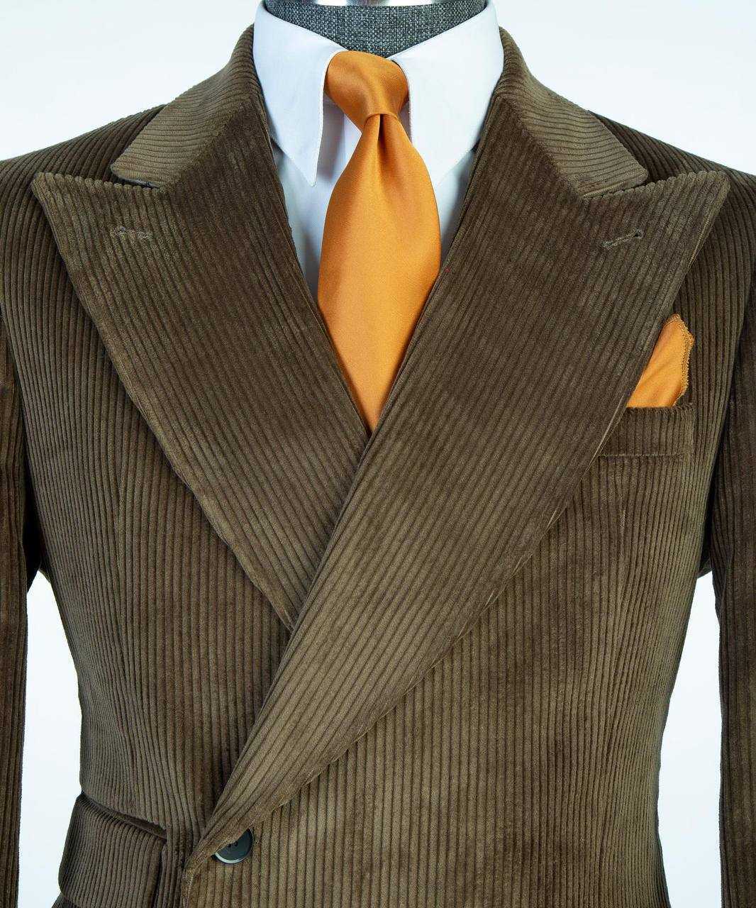 Olive ribbed velvet single-breasted suit peak lapels, close view