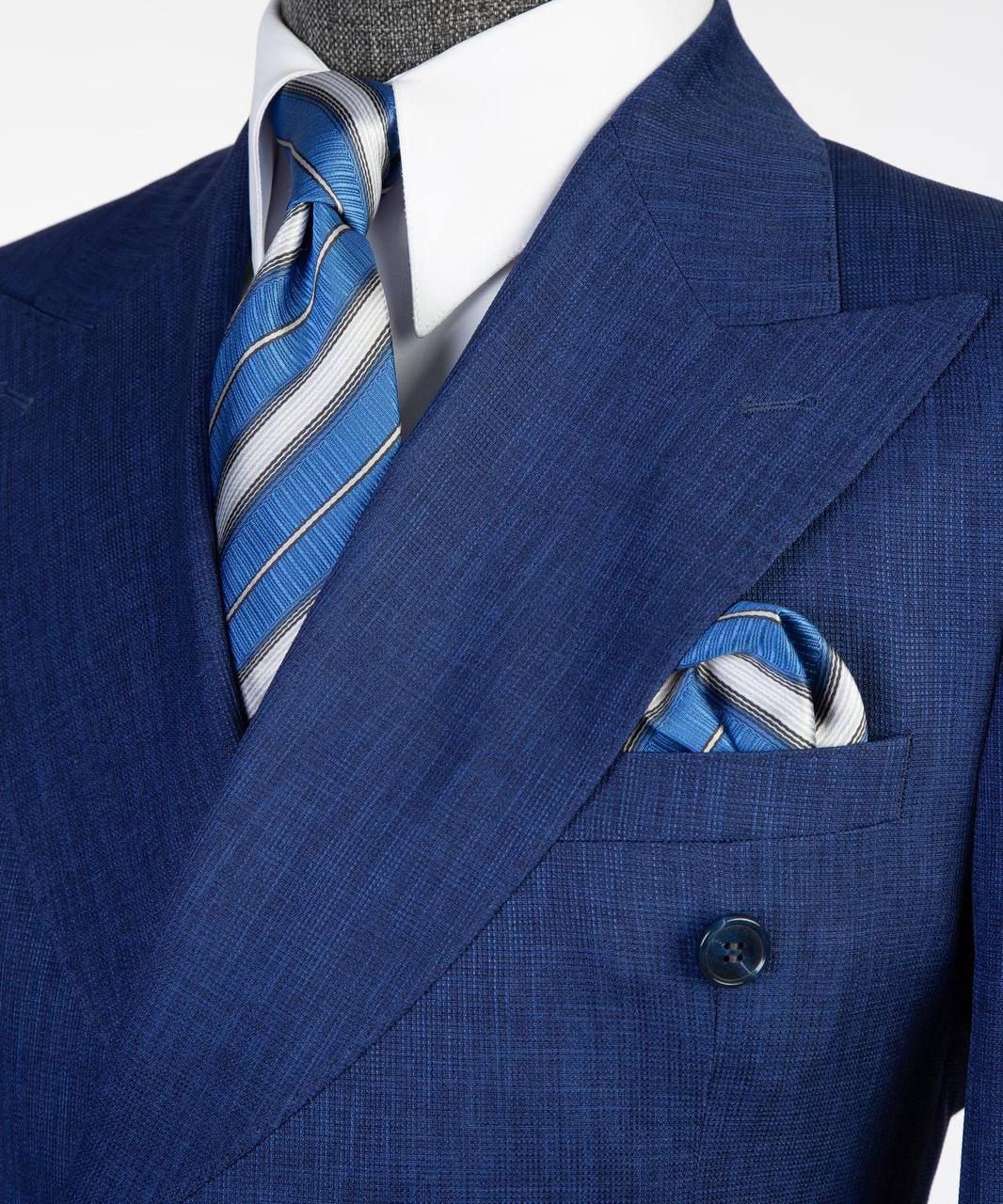 Royal blue double-breasted suit with flared trousers detail