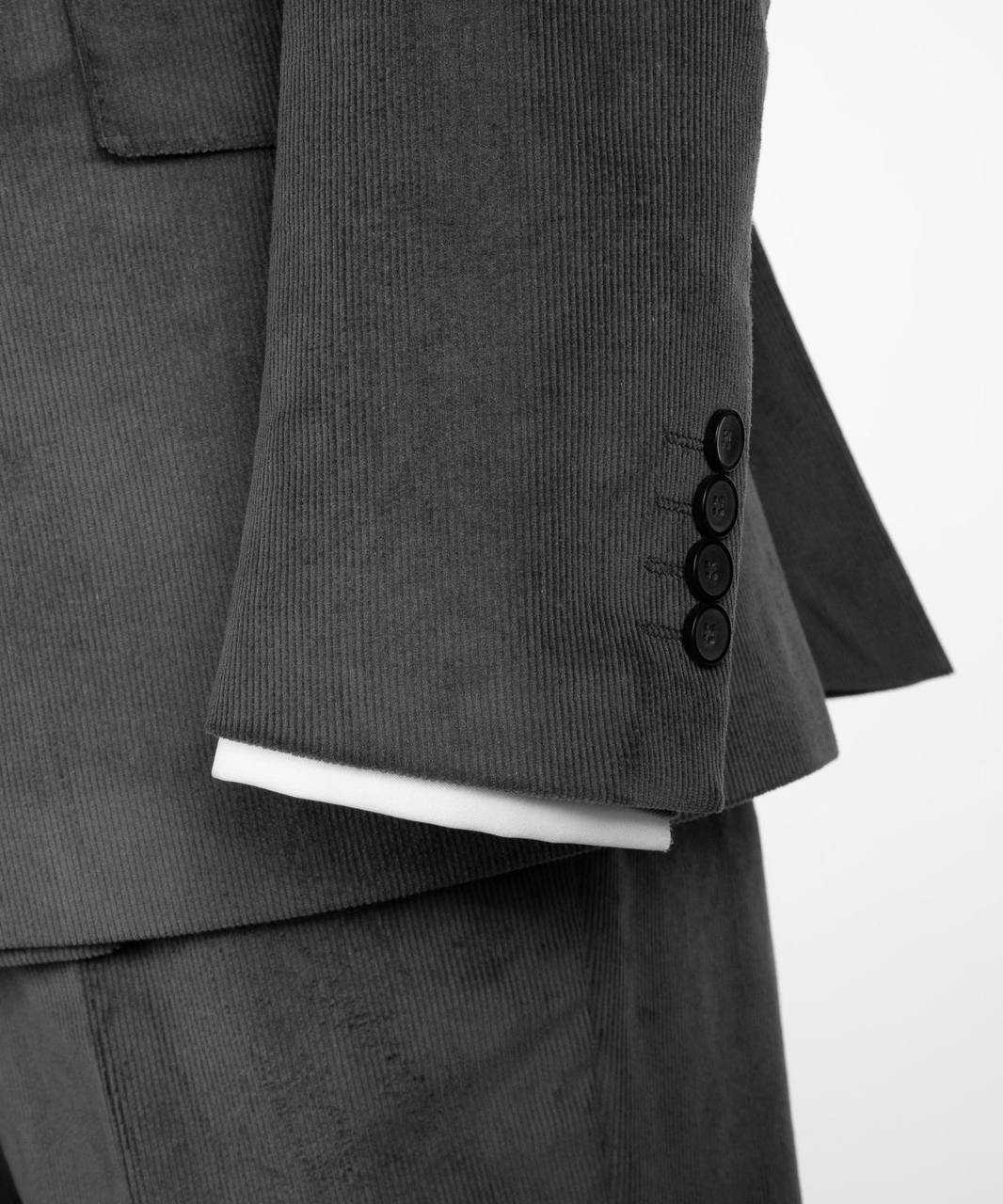 Charcoal ribbed velvet suit sleeve and button detail