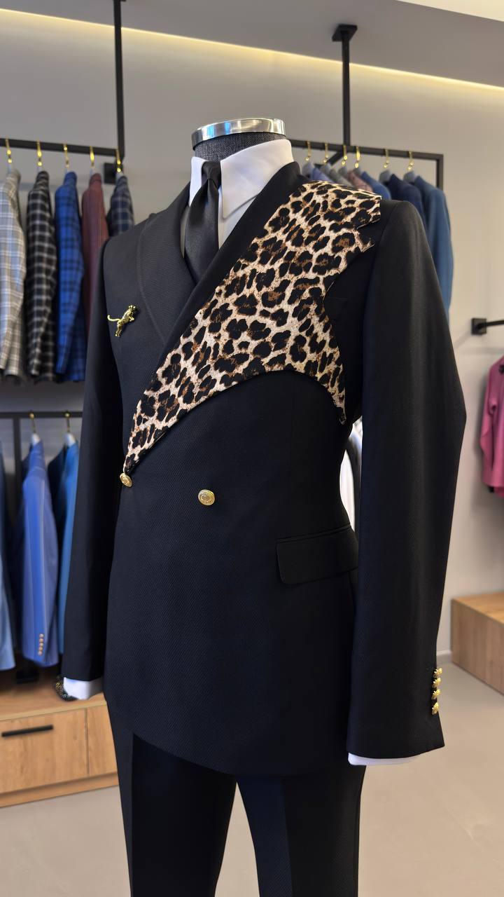 Black leopard-panel double-breasted suit in showroom