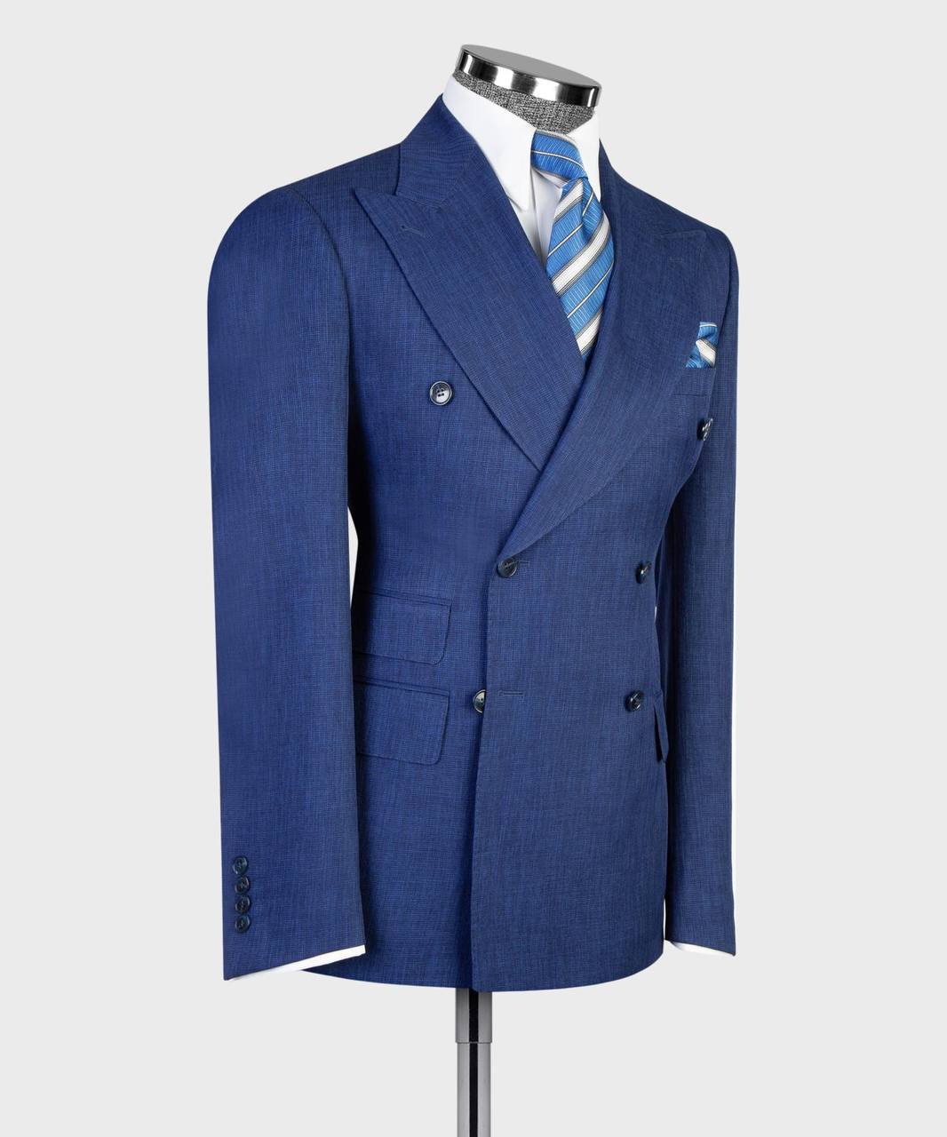 Royal blue double-breasted suit with flared trousers detail