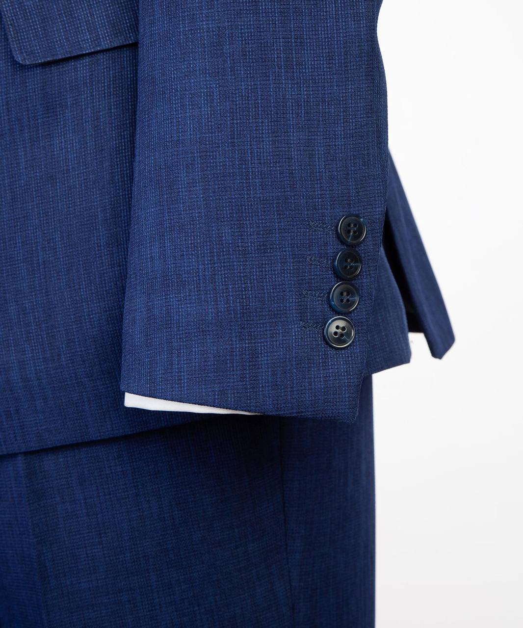 Royal blue double-breasted suit with flared trousers detail