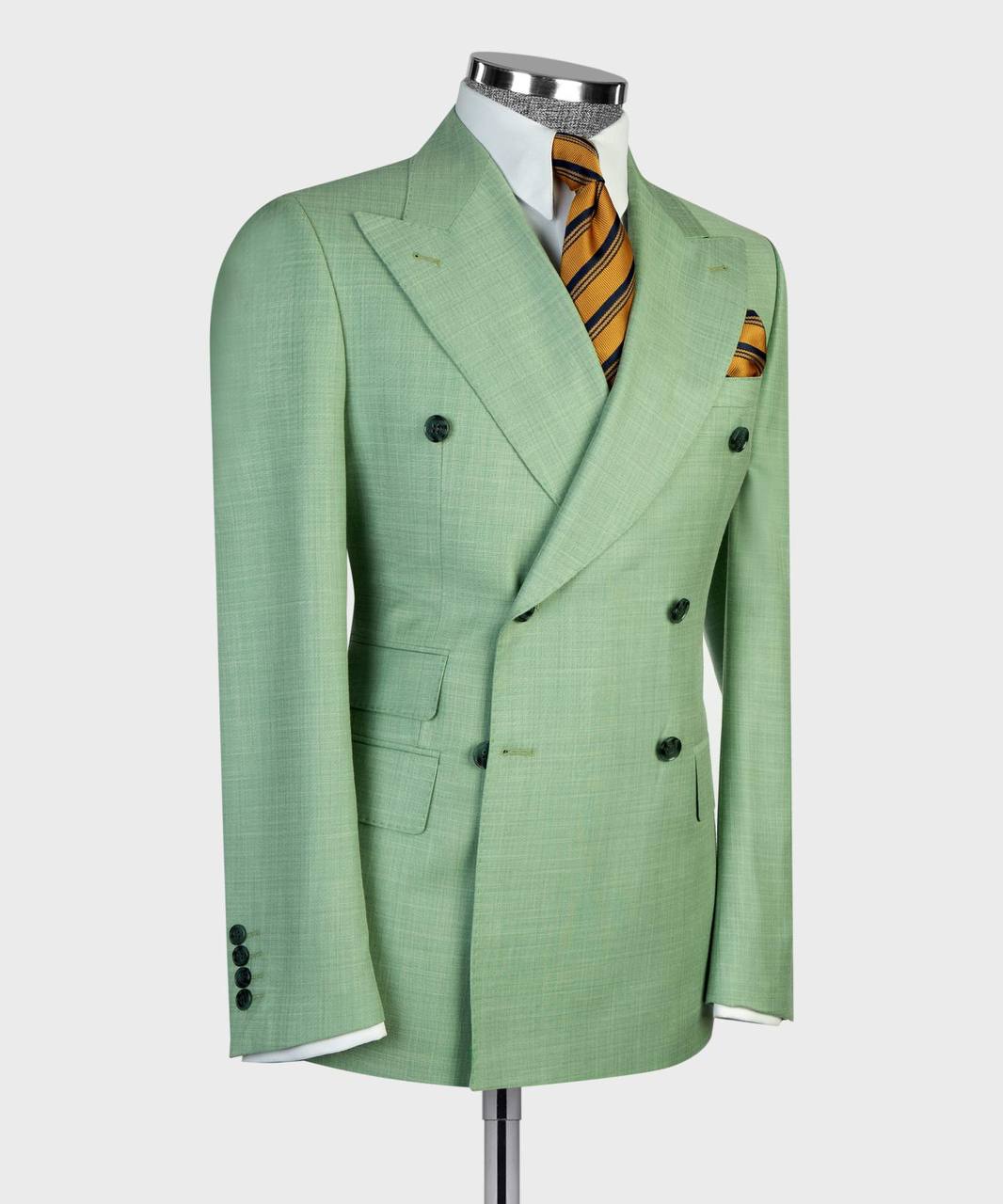 Light mint green double-breasted suit jacket detail