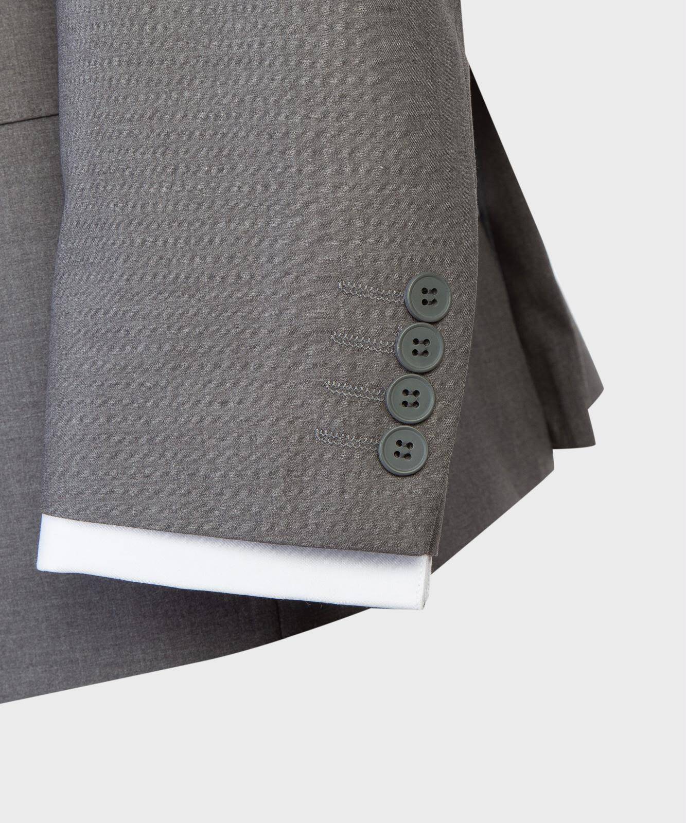 Medium gray suit jacket four-button cuff detail