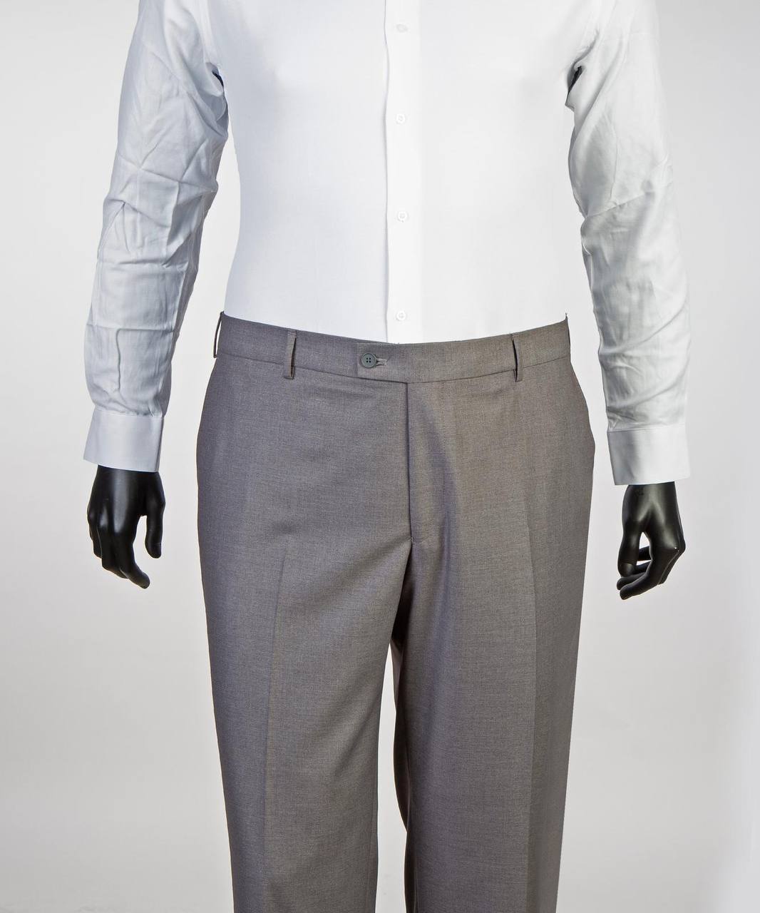 Gray suit trousers styled with white dress shirt