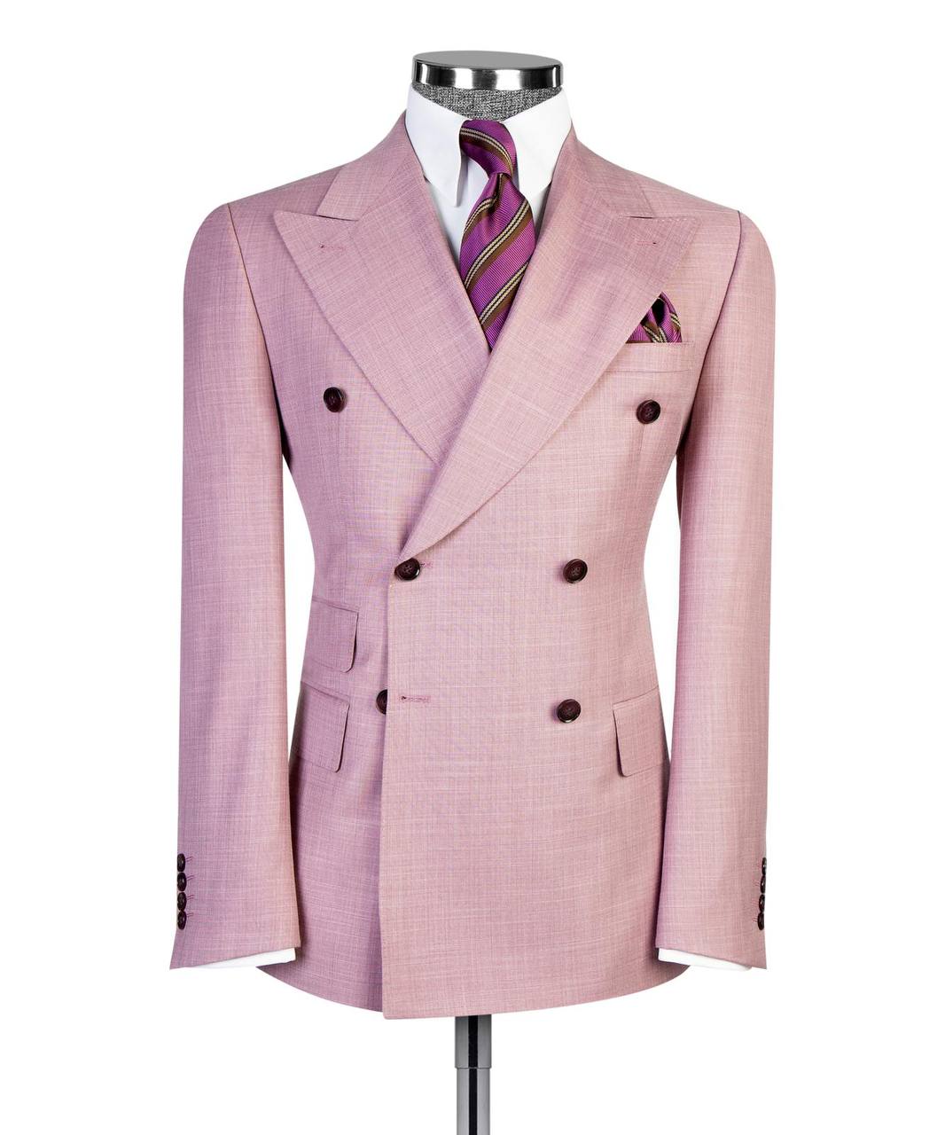 Soft pink double-breasted jacket front with purple striped tie and pocket square