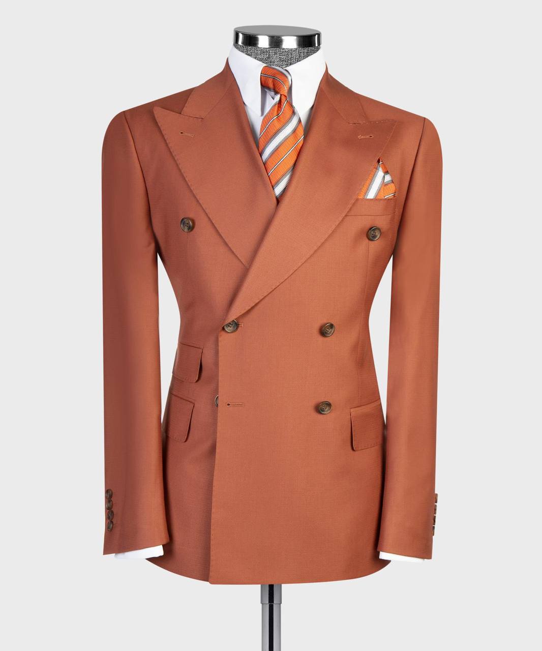 Rust orange double-breasted suit jacket with striped tie styling