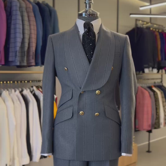 Slate blue pinstripe double-breasted suit with gold buttons from The Third Gentleman, video view